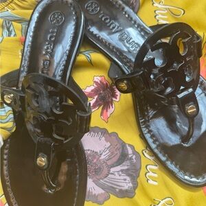 Tory Burch Glossy Black Sandals with Gold Details